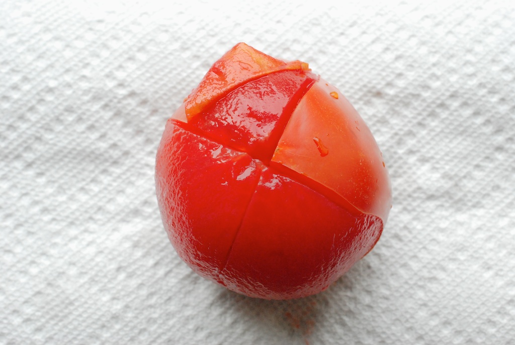 tomato, skin half removed
