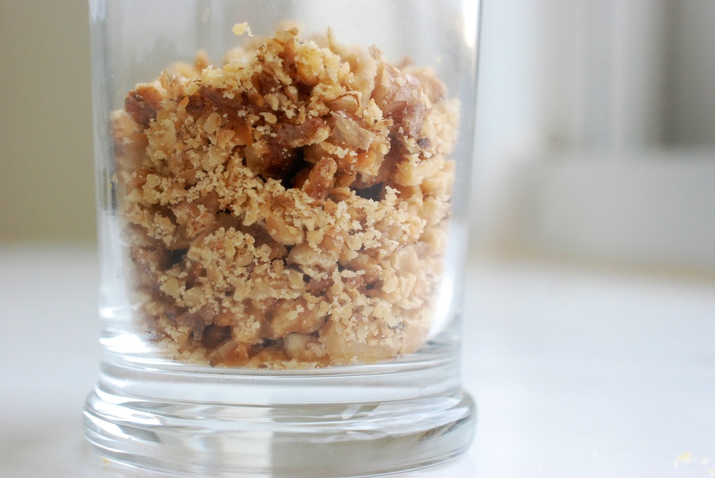 crushed walnuts in a cup