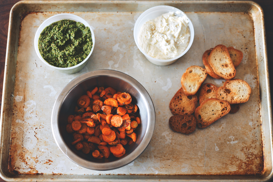 Honey-Roasted Carrot Tartines with Whipped Goat Cheese and Pistachio-Carrot Top Pesto