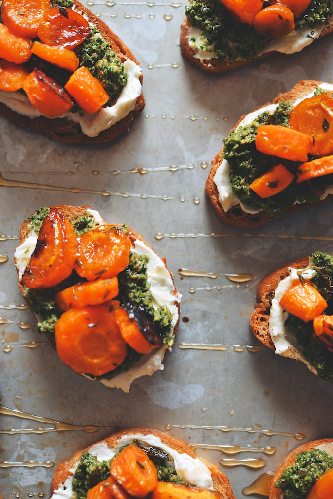 Honey-Roasted Carrot Tartines with Whipped Goat Cheese and Pistachio-Carrot Top Pesto